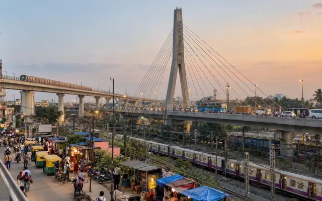 KR Puram cable bridge over the railway lines at sunset