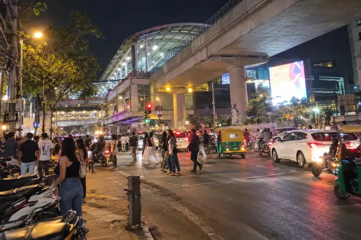 MG Road metro station and evening traffic in central Bangalore