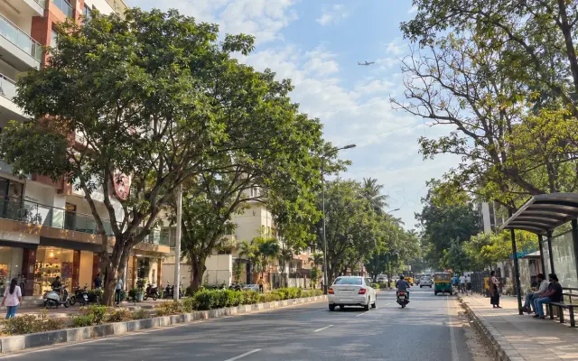 Wide tree-lined main road in Yelahanka New Town