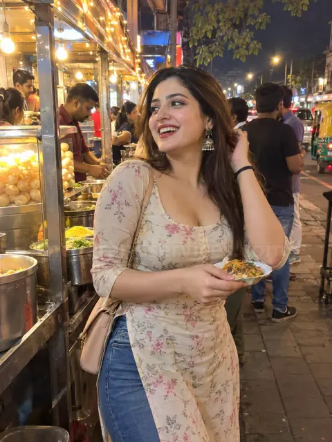 Punjabi girl in a kurti and jeans at a street food stall