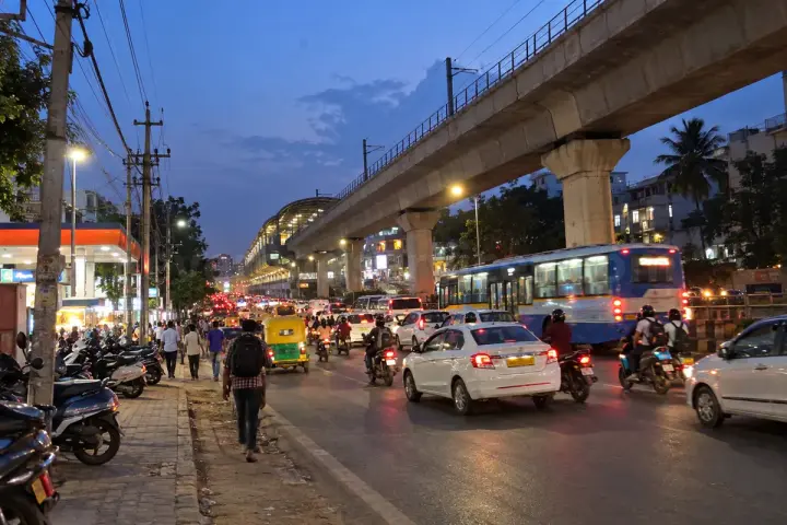 Hosur Road at Bommanahalli with metro pillars and evening traffic