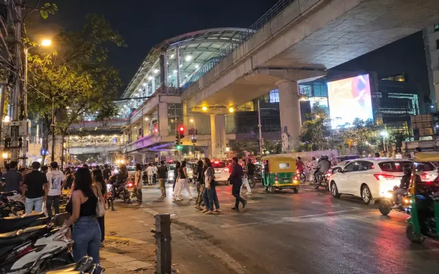MG Road metro station and evening traffic in central Bangalore
